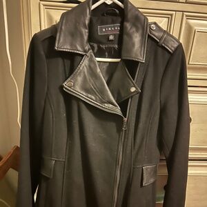 Woman’s black coat